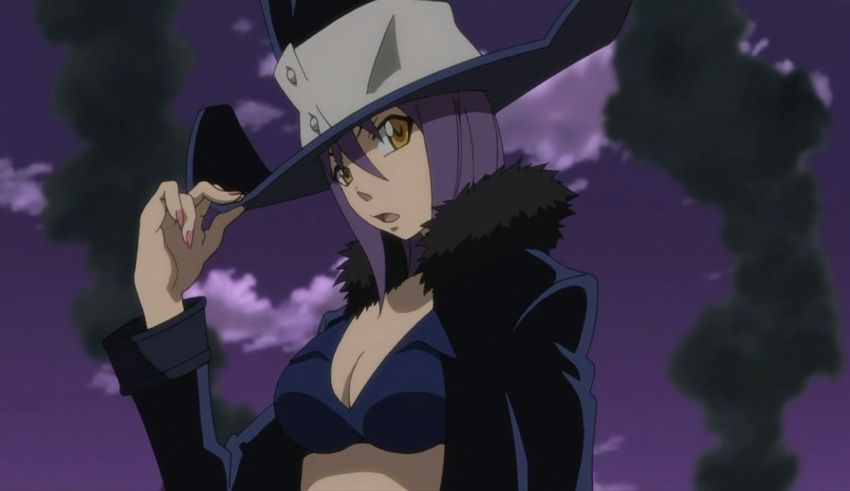 A woman wearing a black hat and a black coat.