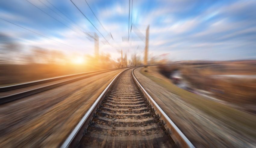 A blurry image of a train on a track.