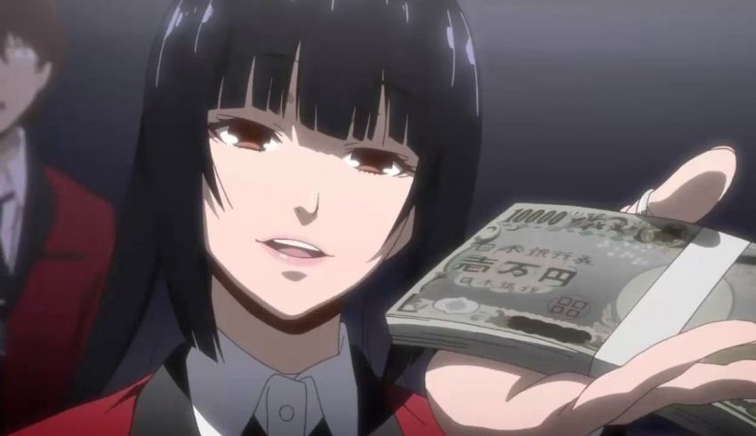 A girl in a red suit is holding money in her hand.