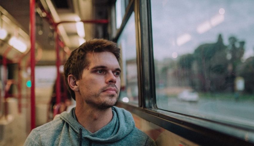 A man looking out a window.
