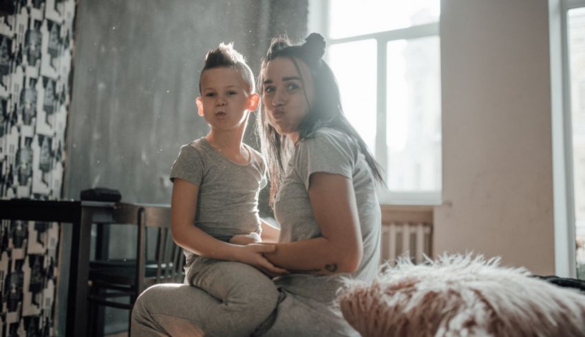A woman and a child posing for a picture.