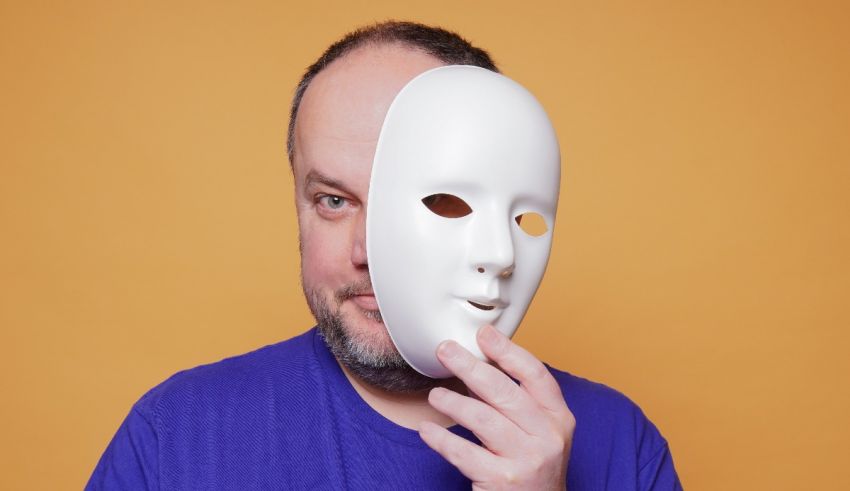 A man with a white mask on his face.