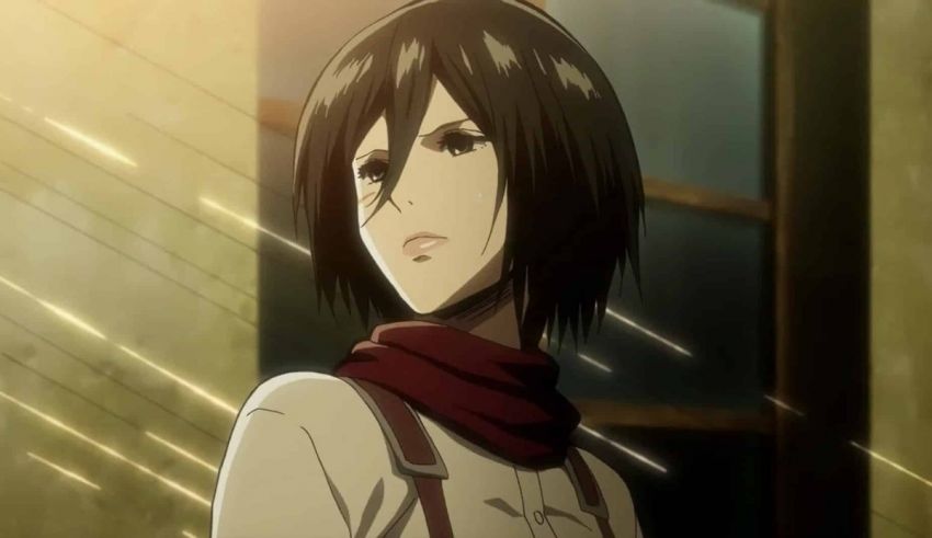 An anime girl with black hair and a red scarf.