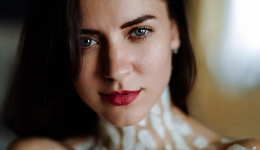 A woman with white paint on her body.