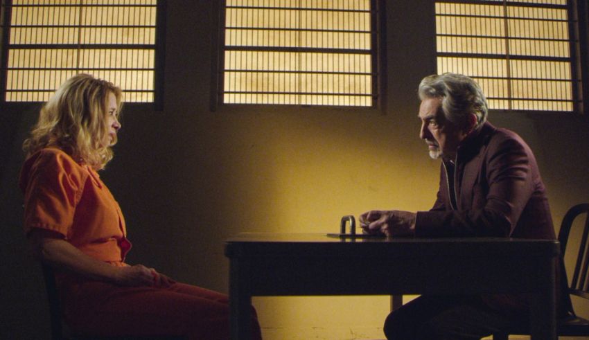 A man and a woman sitting at a table.