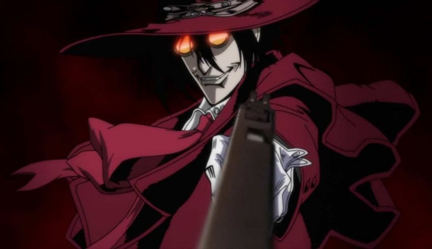 A man in a red hat holding a gun.