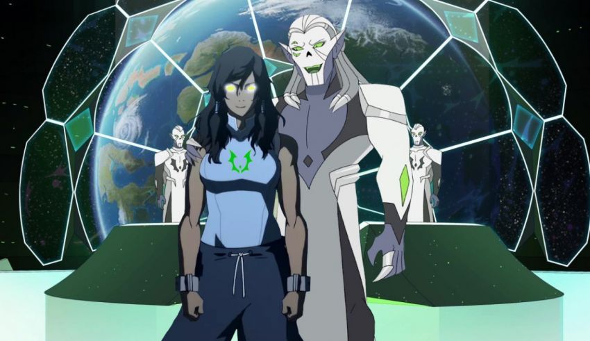 A man and a woman standing in front of a planet.