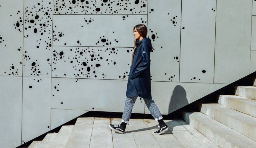 A woman walking down a set of stairs.
