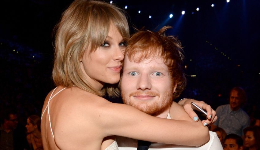 Taylor swift and ed sheeran at the grammy awards.