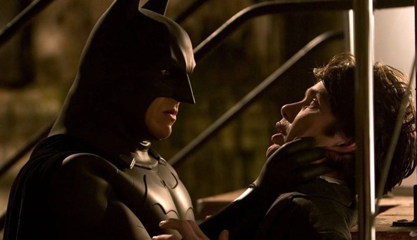 Robert downey jr and robert downey jr in batman the dark knight rises.
