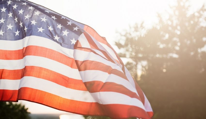 An american flag waving in the wind.
