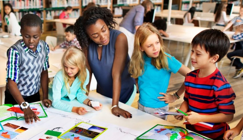 A group of children working together in a library.