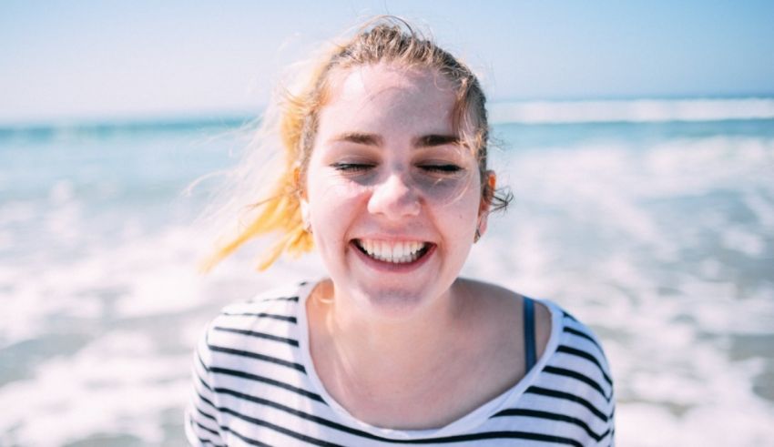 A woman smiling at the camera.