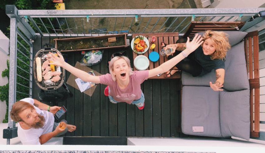 An aerial view of a group of people on a balcony.