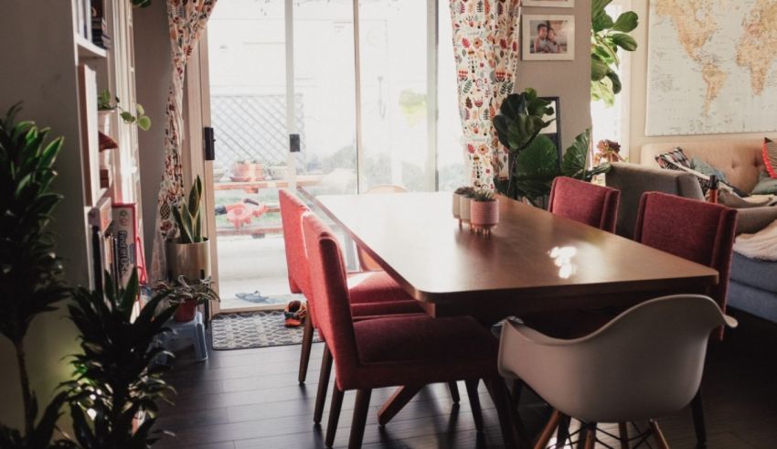 A living room with a dining table and chairs.