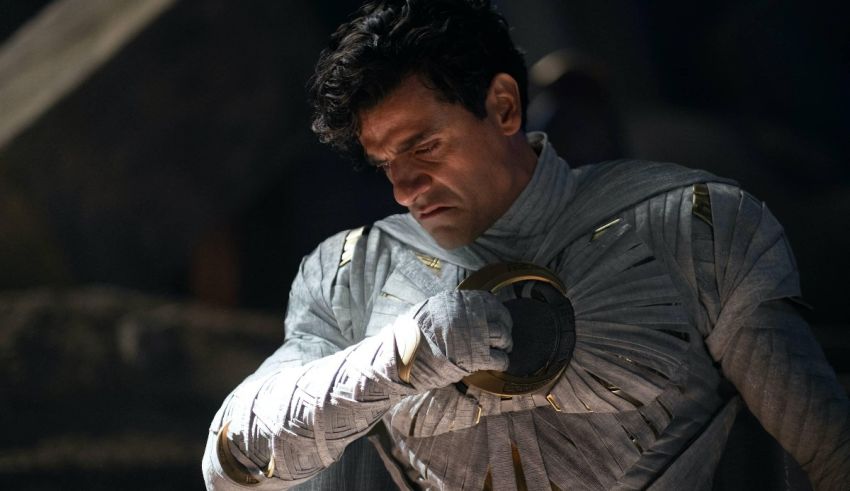 A man in a white costume is holding a sword.