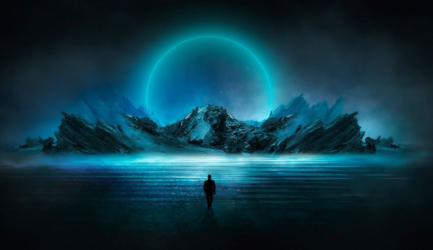 An image of a person standing in front of a blue sphere.