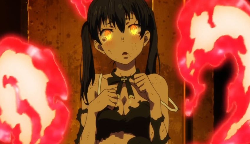 A girl in a black dress with red flames around her.