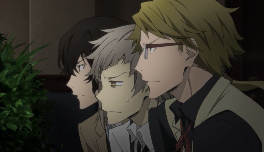 A group of men looking at each other.