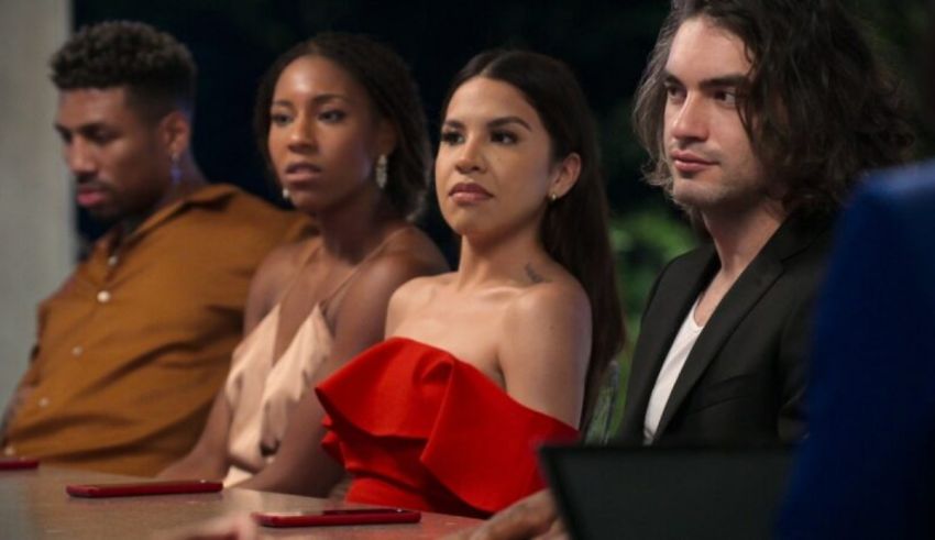 A group of people sitting at a table.