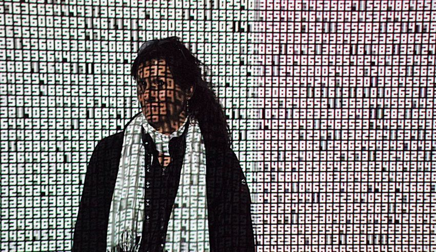 A woman wearing a scarf.