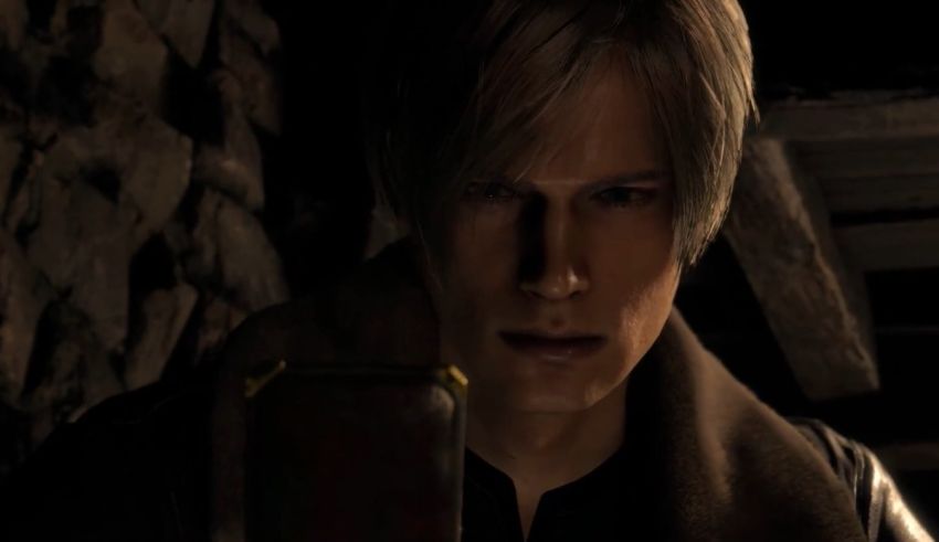 A man is holding a gun in a dark room.