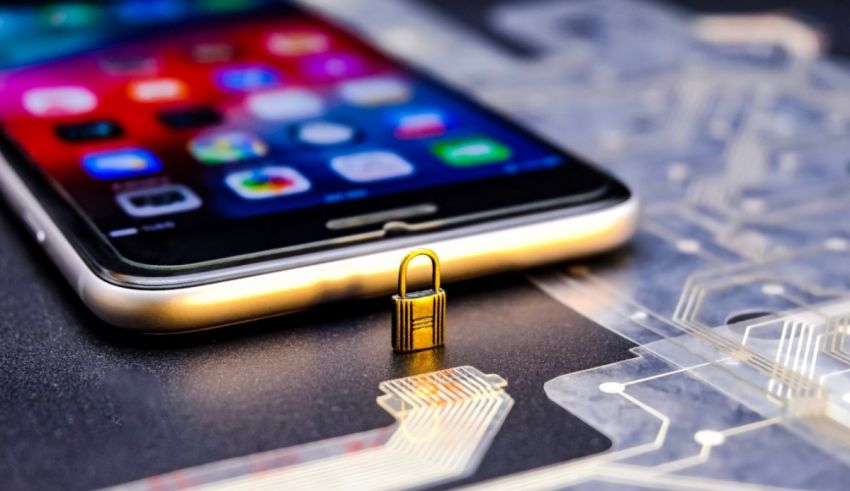 An iphone is sitting on top of a circuit board.