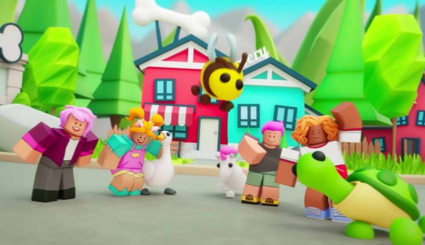 A group of toy animals in front of a house.