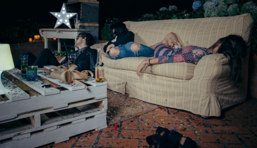 A group of people sitting on a couch.