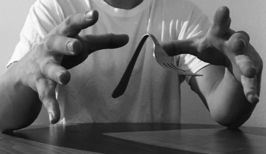 A man holding a fork and knife.