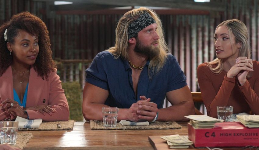 A group of people sitting around a table.