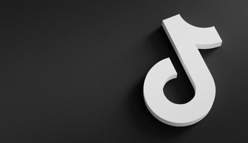 A white tiktok logo on a black background.