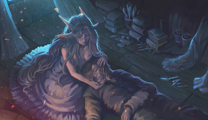 A man and a woman are laying on the ground.