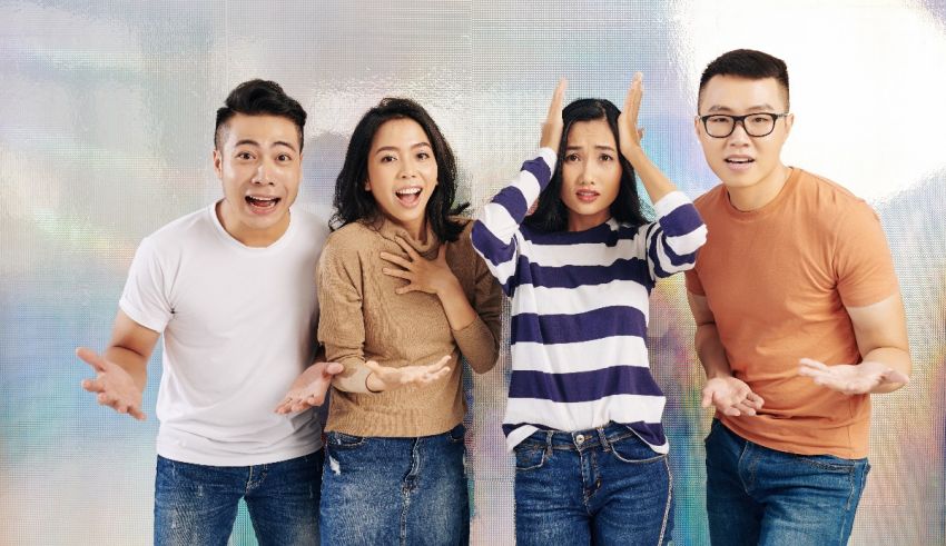 A group of asian friends posing for a photo.