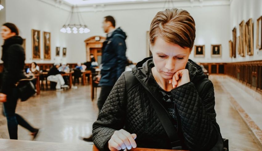 A woman sitting at a table.