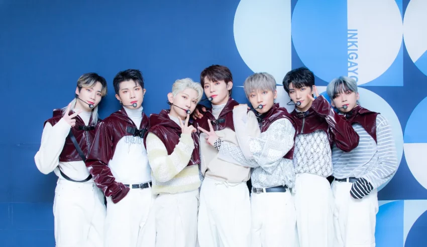 A group of korean boys posing for a photo.