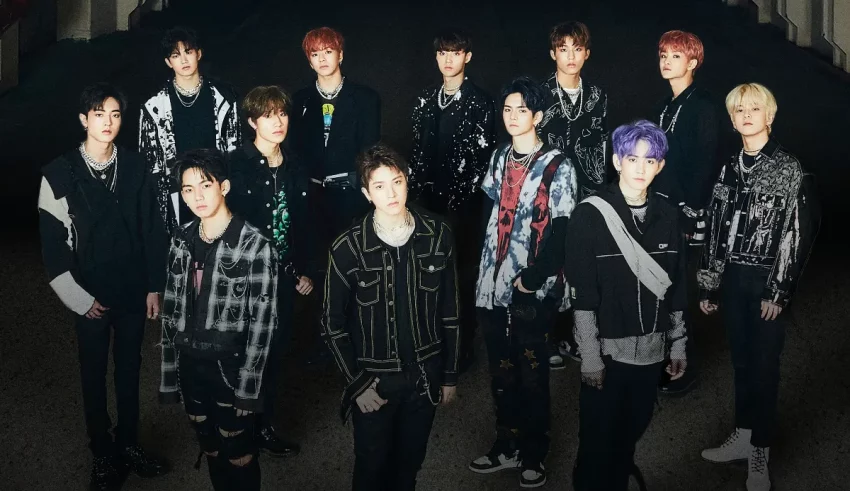 A group of korean boys posing for a picture.