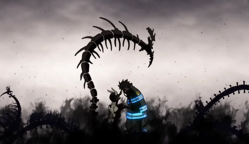 A man is standing in front of a large group of skeletons.